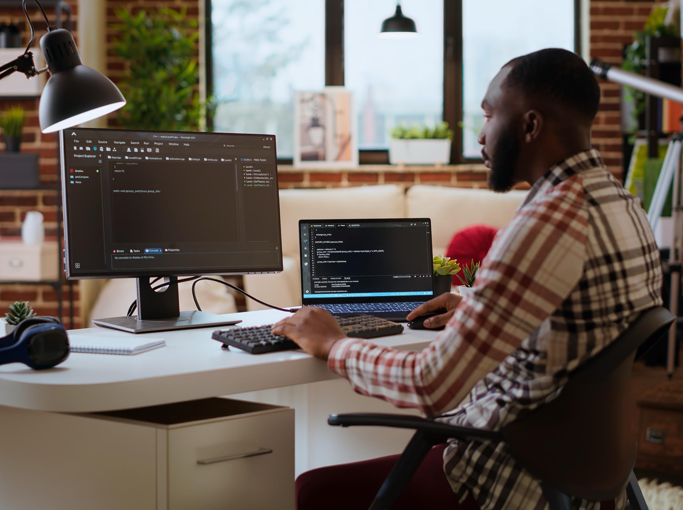 Developer integrating checkout from a laptop