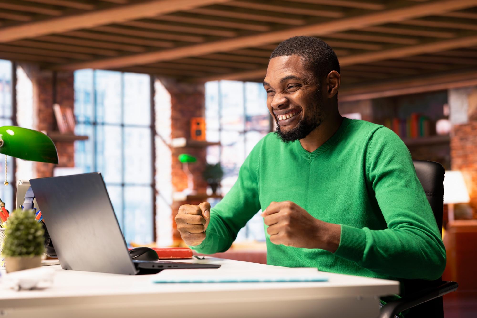 Person celebrating a successful payment